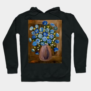 Some blue corn flowers and white and yellow daisy's flowers in a metallic vase Hoodie